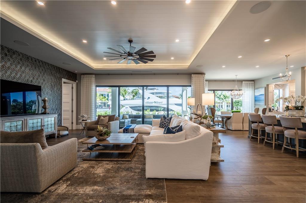 2349 Northeast 24th Street Lighthouse Point, FL 33064 - Photo 20 of 85 a living room with furniture and a large window