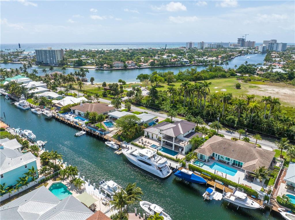 2349 Northeast 24th Street Lighthouse Point, FL 33064 - Photo 4 of 85 an aerial view of lake residential houses with outdoor space and seating