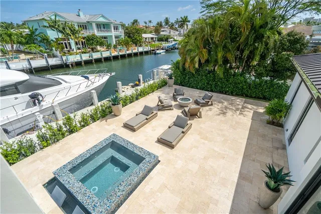 a bathroom with a toilet a sink and a mirror