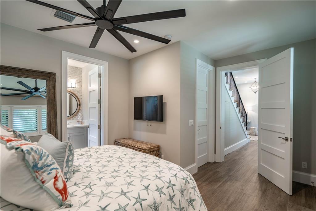 2349 Northeast 24th Street Lighthouse Point, FL 33064 - Photo 57 of 85 a bedroom with a bed and a flat screen tv