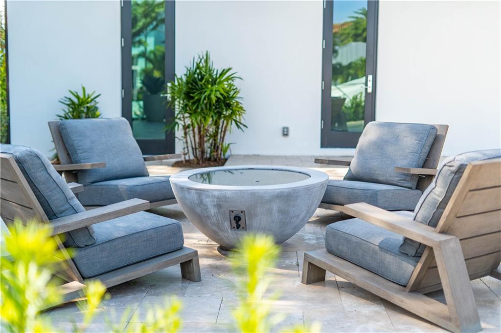 2349 Northeast 24th Street Lighthouse Point, FL 33064 - Photo 83 of 85 a living room with furniture and a potted plant