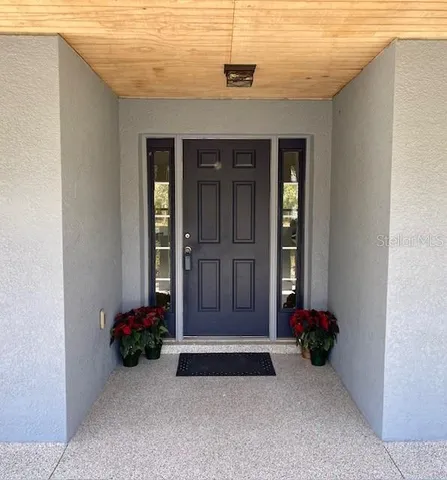 a view of a lake with a yard