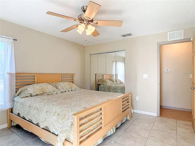 a view of an empty room with a balcony