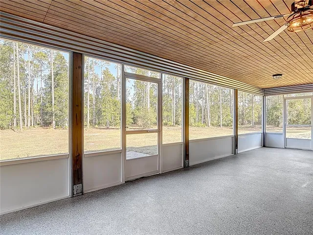 a view of a lake with a yard