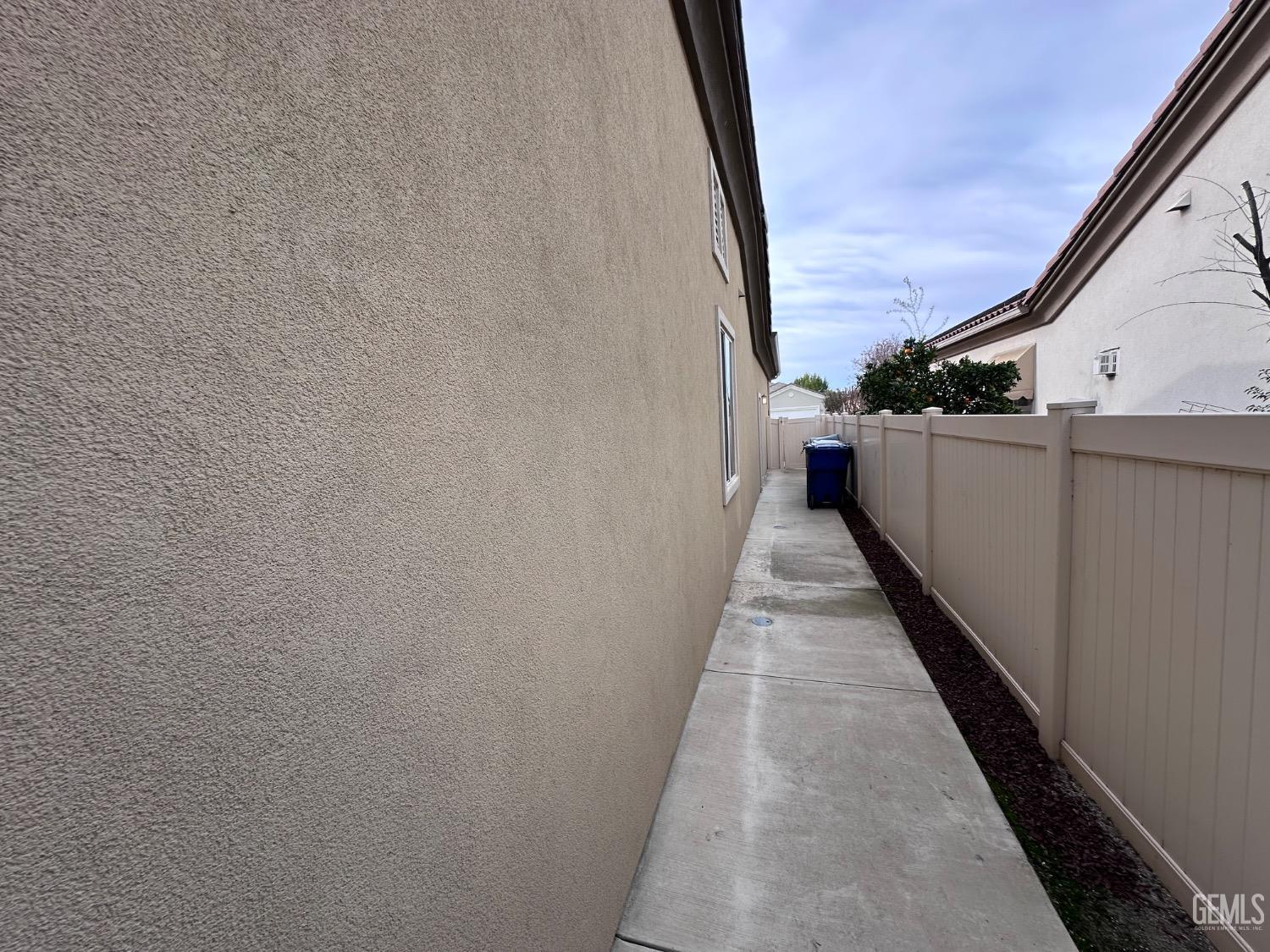 Undisclosed Address Bakersfield, CA 93306 - Photo 12 of 43 a view of a balcony with wooden floor and fence
