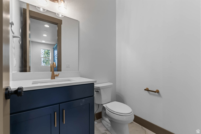 2724 Mt Jordan Road Sandy, UT 84092 - Photo 20 of 33 Bathroom featuring vanity and recessed lighting