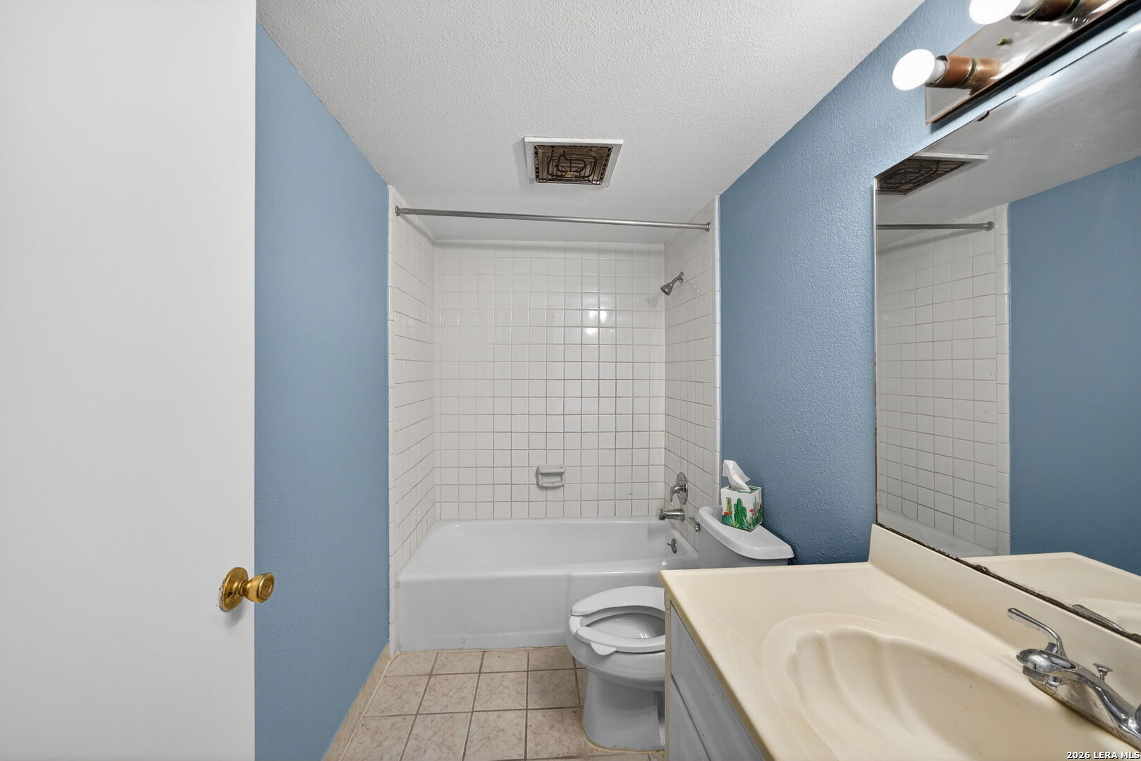 6718 Callaghan Road, Unit 315 San Antonio, TX 78229 - Photo 21 of 27 a bathroom with a sink toilet and shower