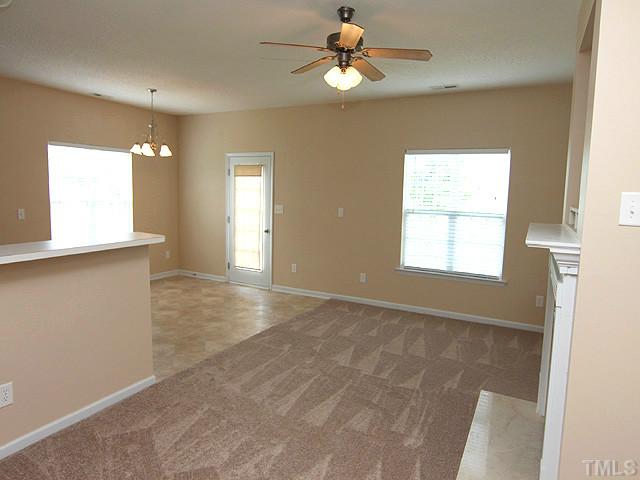 678 Citrus Petal Road Fuquay-Varina, NC 27526 - Photo 2 of 14 a view of an empty room with a window