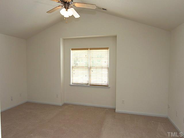 678 Citrus Petal Road Fuquay-Varina, NC 27526 - Photo 5 of 14 an empty room with a window
