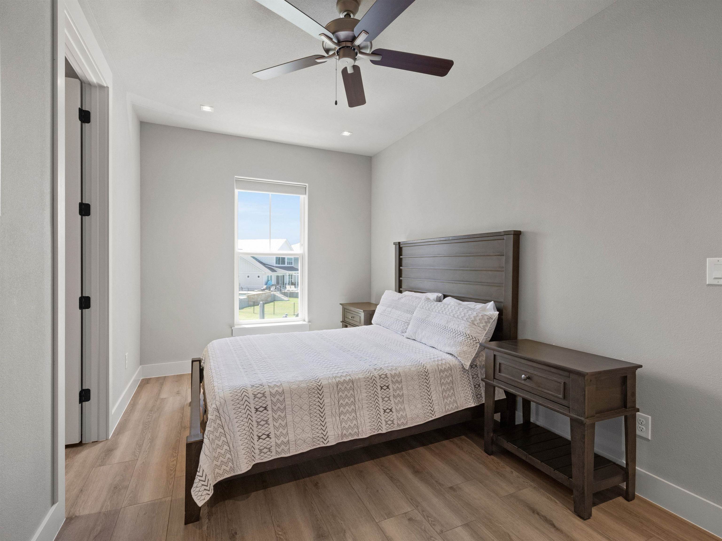 200 Archview Lane Kingsland, TX 78639 - Photo 20 of 45 a bedroom with a bed and window
