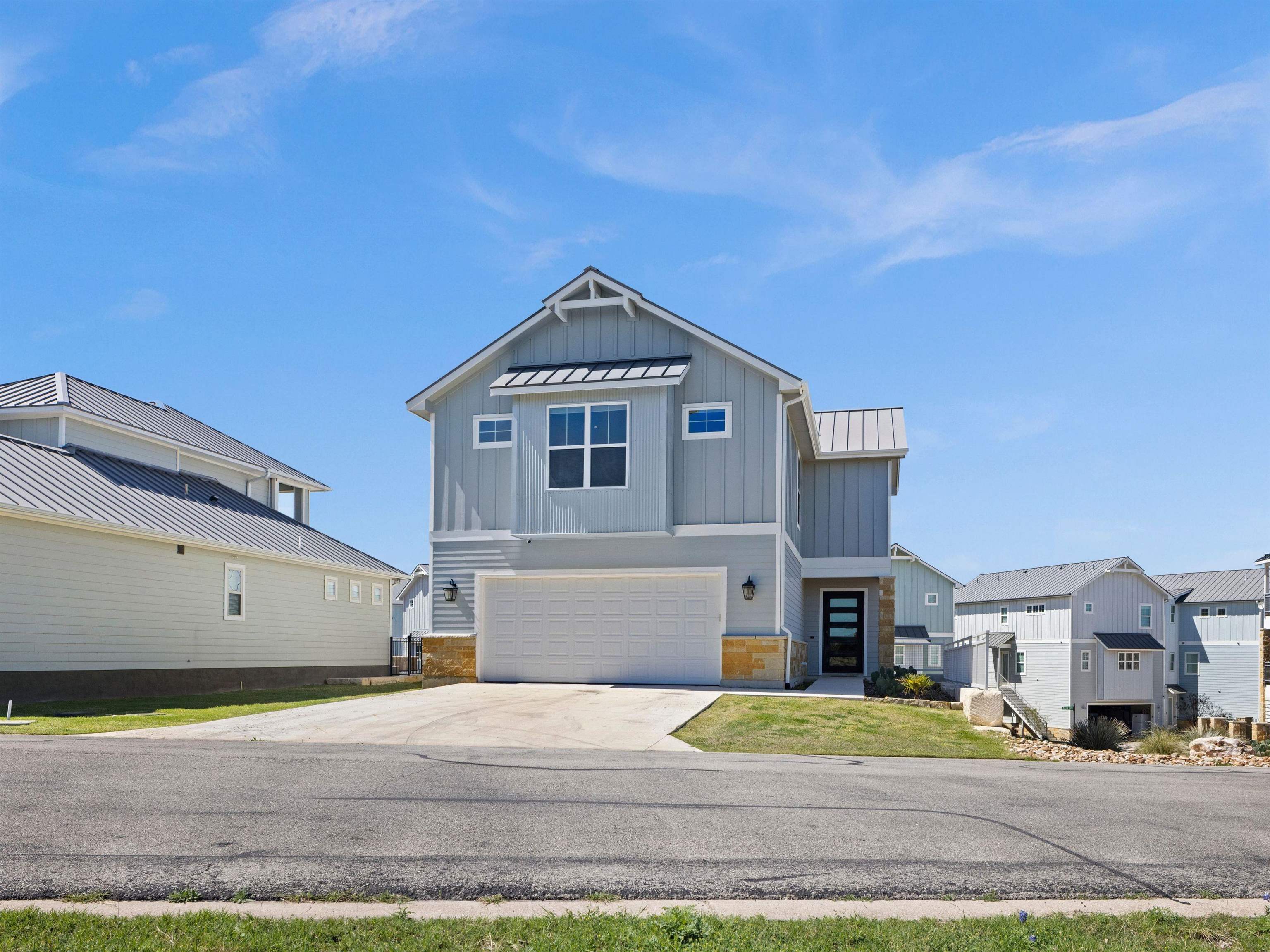 200 Archview Lane Kingsland, TX 78639 - Photo 2 of 45 a front view of a house with a yard