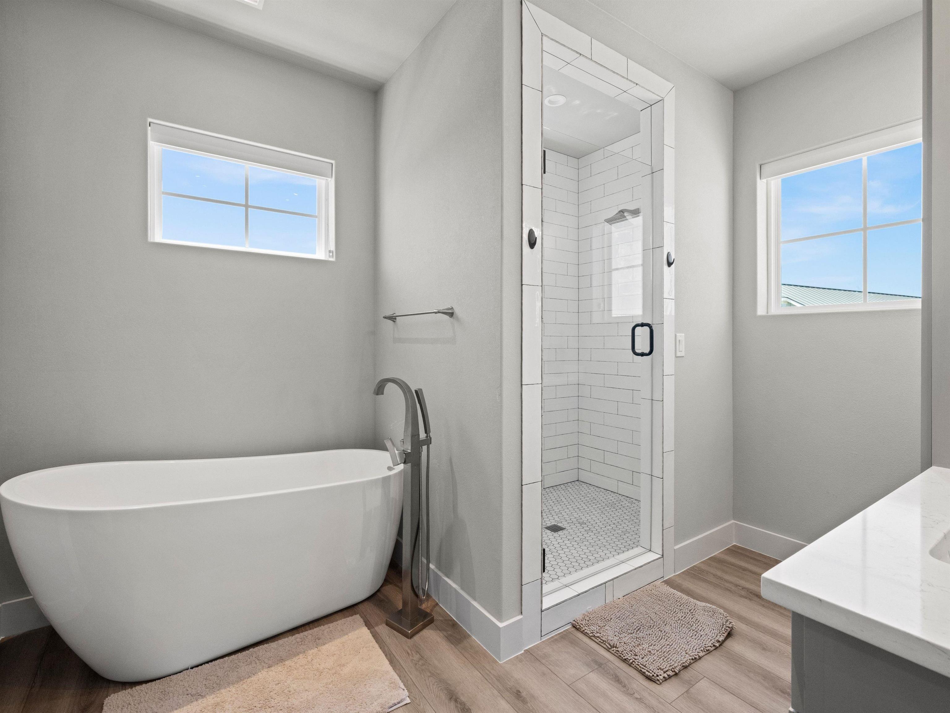 200 Archview Lane Kingsland, TX 78639 - Photo 22 of 45 a white tub sitting next to a bathroom