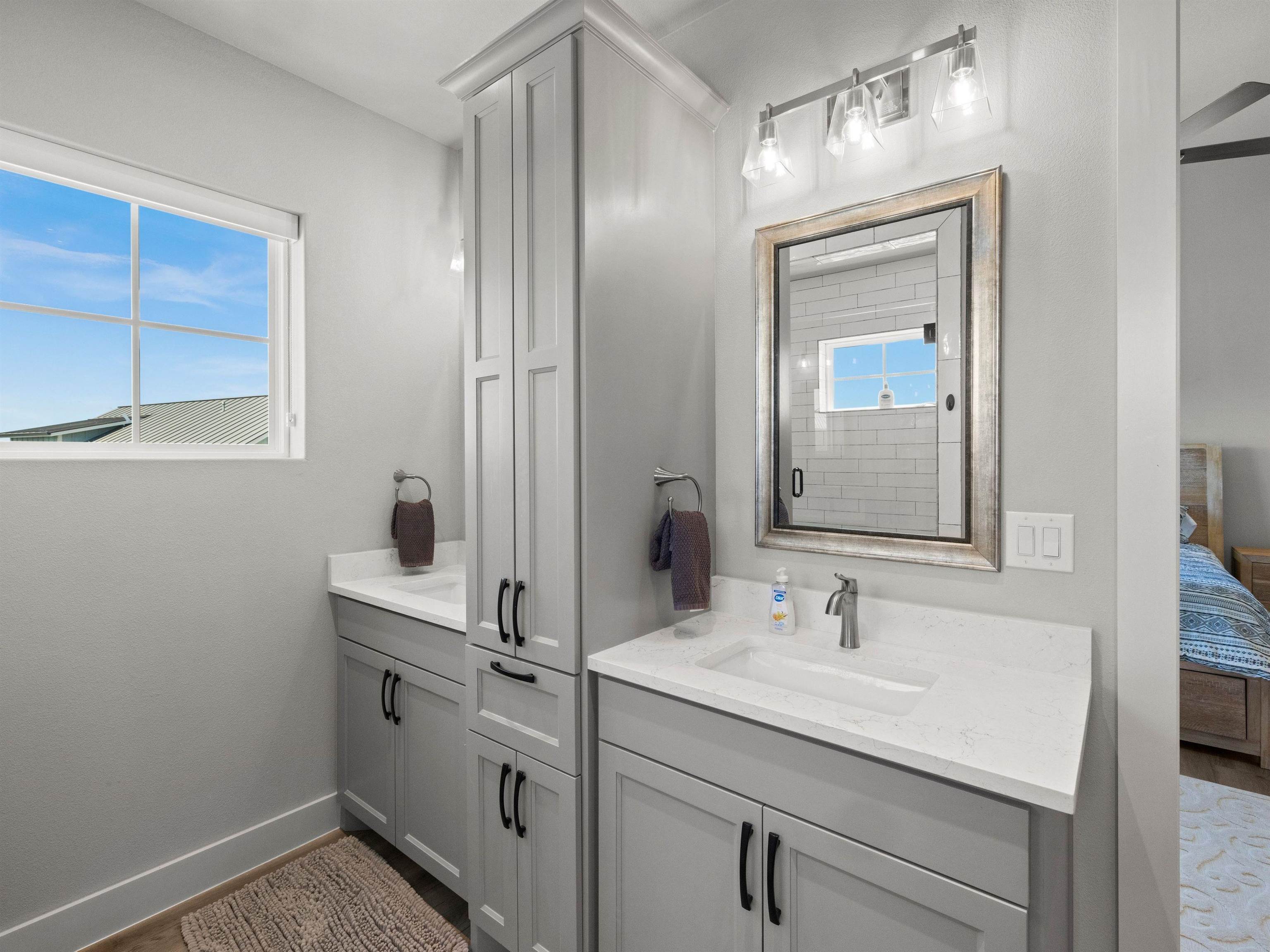 200 Archview Lane Kingsland, TX 78639 - Photo 23 of 45 a bathroom with a sink a vanity and a mirror