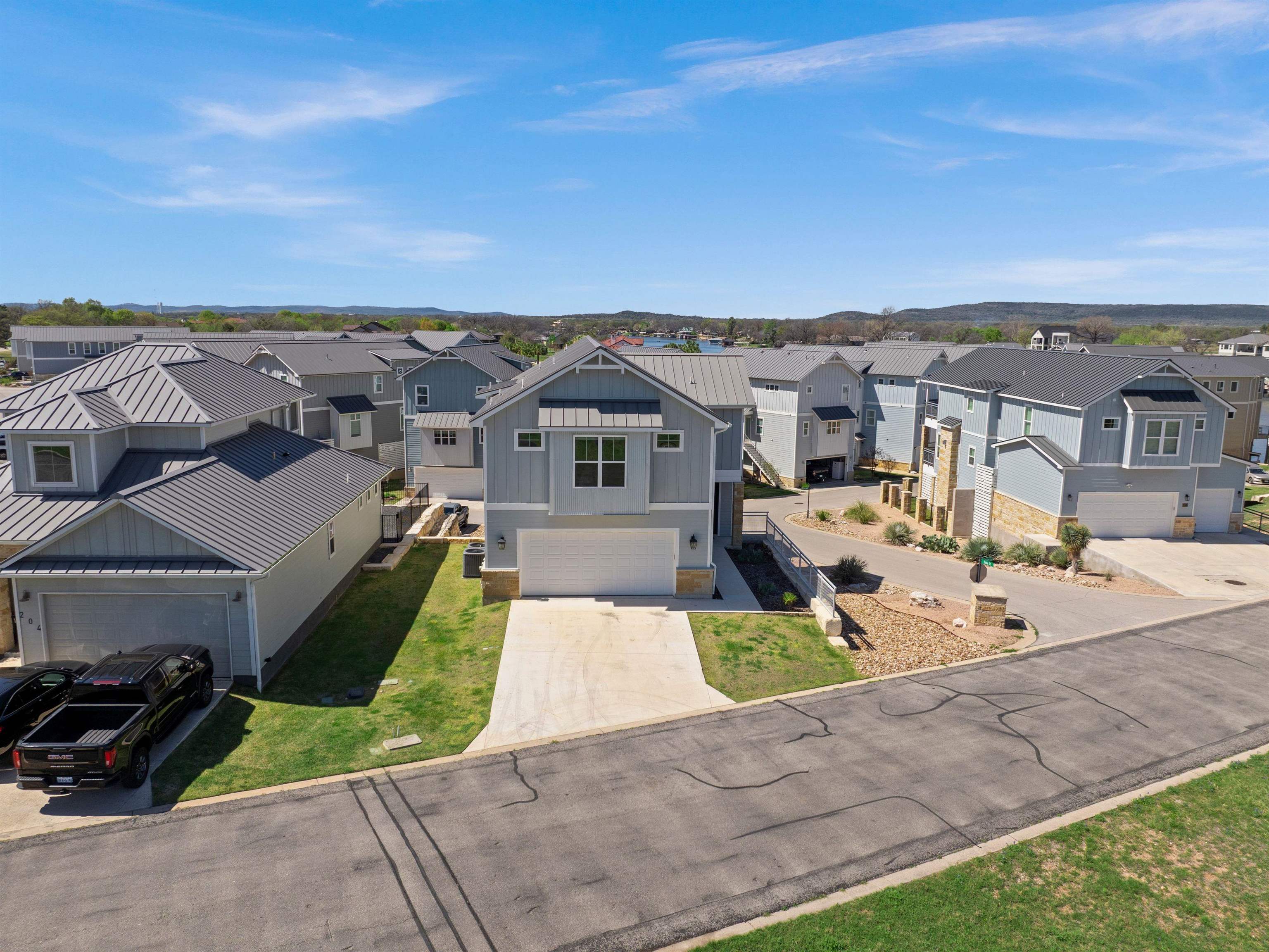 200 Archview Lane Kingsland, TX 78639 - Photo 31 of 45 an aerial view of a house with a garden and lake view