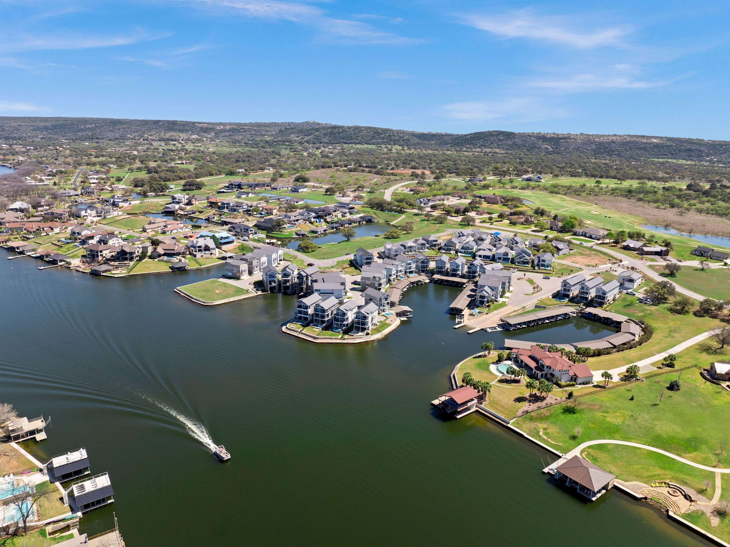 200 Archview Lane Kingsland, TX 78639 - Photo 43 of 45 an aerial view of a city with lots of residential buildings ocean and mountain view in back
