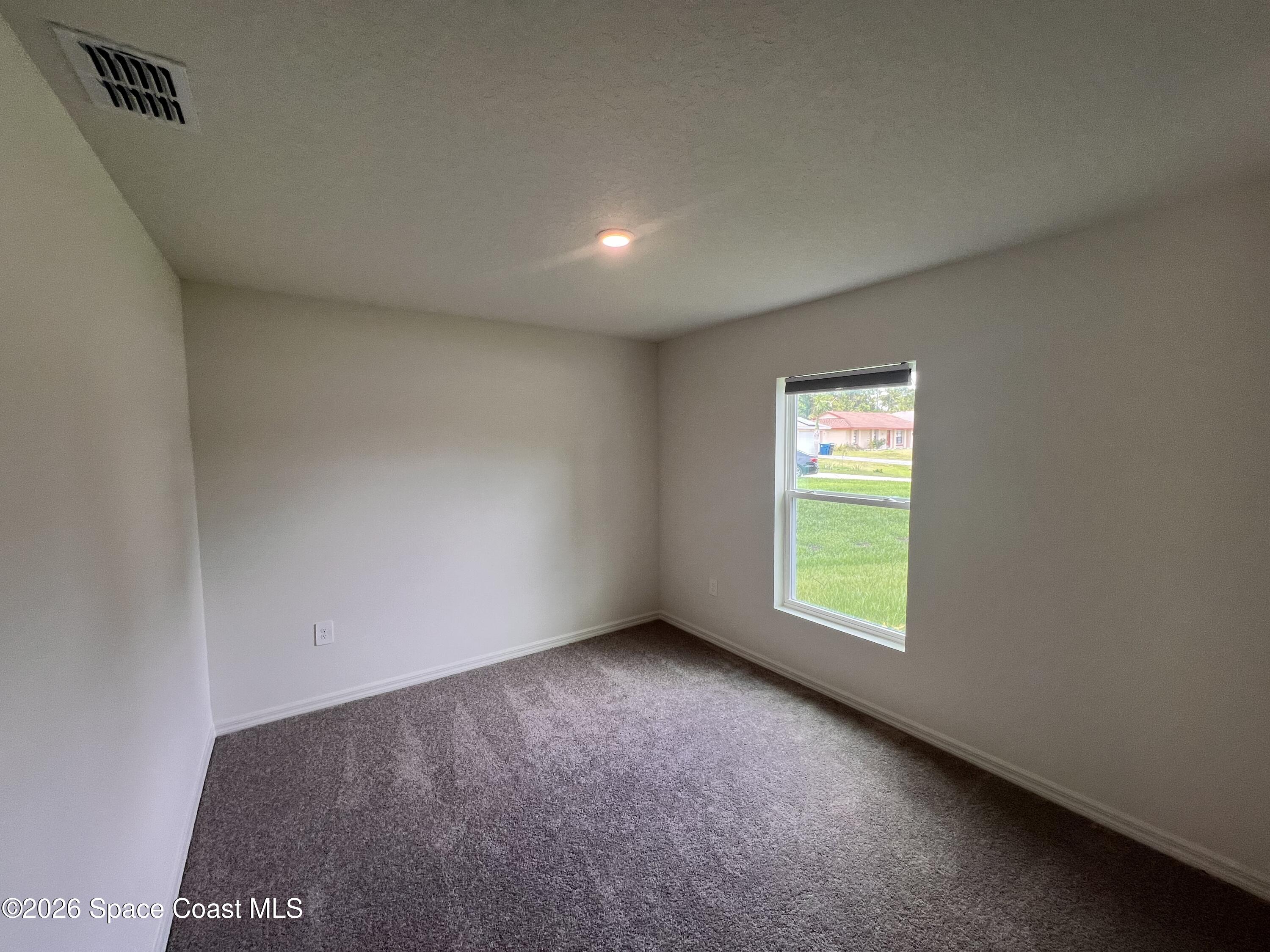 2182 Watkins Road Southeast Palm Bay, FL 32909 - Photo 2 of 21 IMG_0835