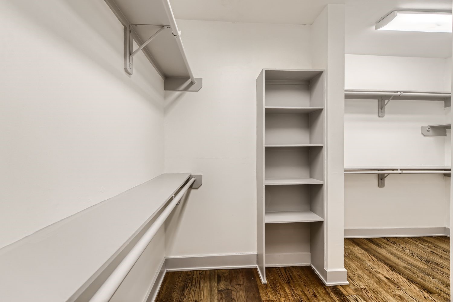 2208 Arabelle Street Houston, TX 77007 - Photo 12 of 26 a view of walk in closet with empty racks