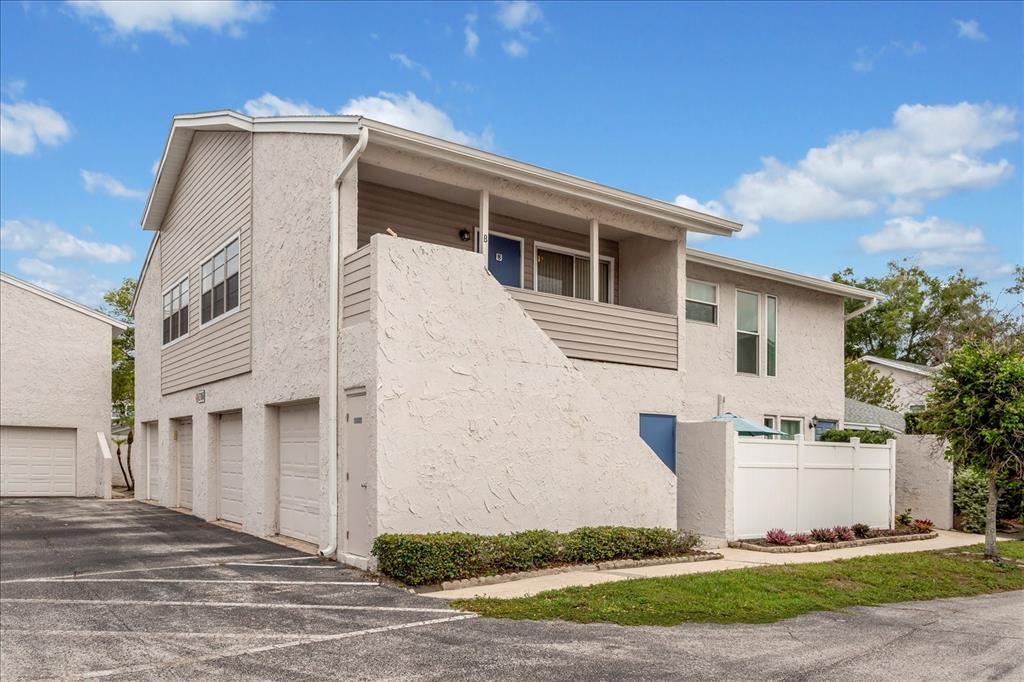 2786 Curry Ford Road, Unit 6B Orlando, FL 32806 - Photo 2 of 27 a front view of a house with a yard