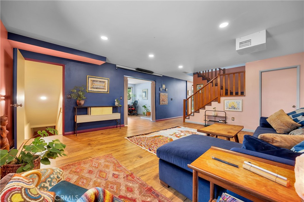 5341 Monterey Road Los Angeles, CA 90042 - Photo 9 of 40 family/great room-open door on the left is staircase down into garage