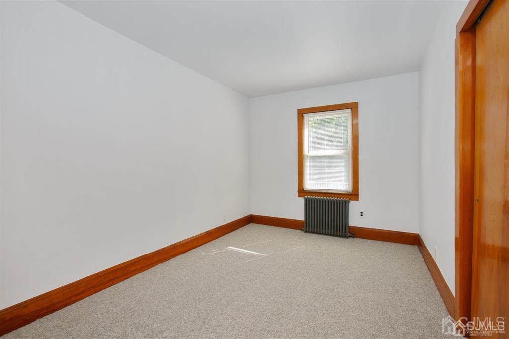 173 Cottrell Road Old Bridge, NJ 07747 - Photo 15 of 28 a view of an empty room with a window