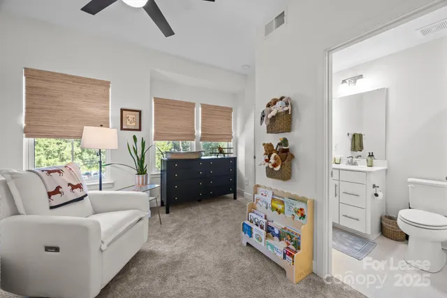 a living room with furniture and decor