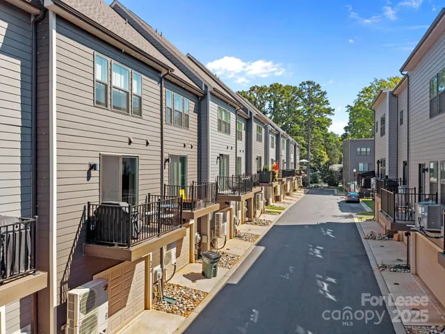 a view of a balcony with chairs