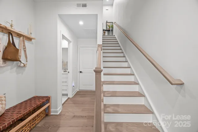 a view of a hallway with staircase