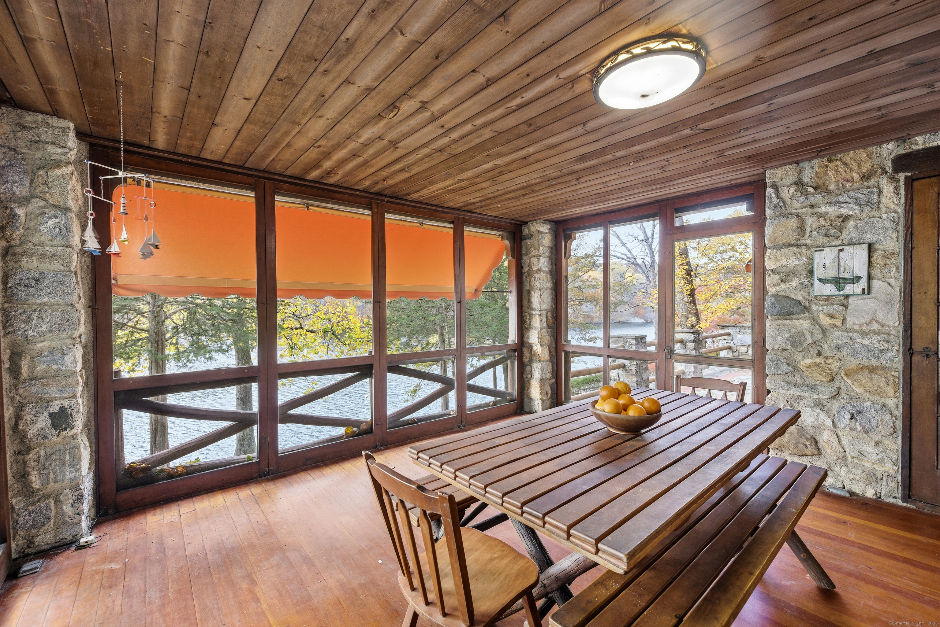 23 Echo Drive New Milford, CT 06776 - Photo 13 of 38 a view of a dining room with furniture window and outside view