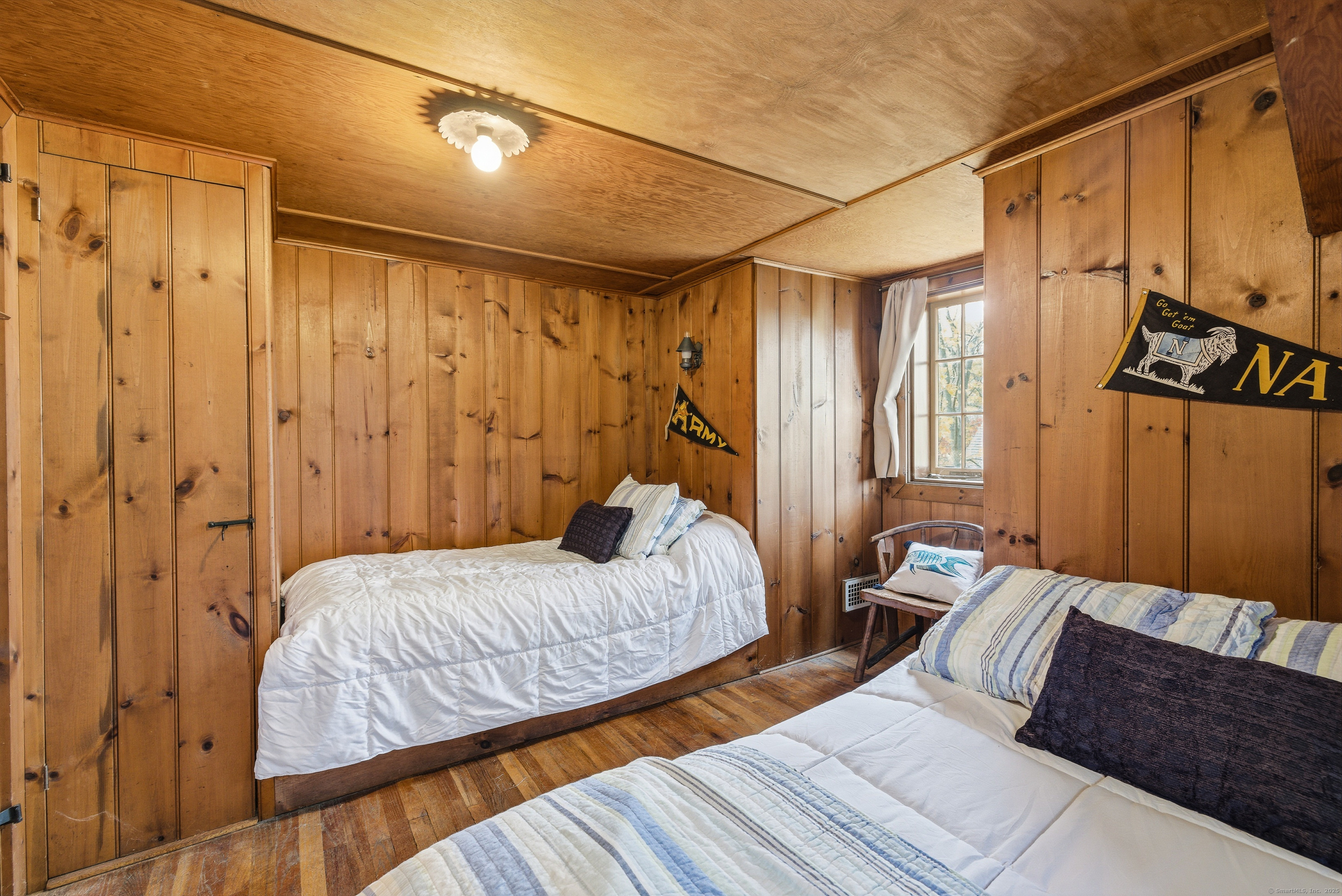 23 Echo Drive New Milford, CT 06776 - Photo 23 of 38 a bedroom with two beds and painted walls