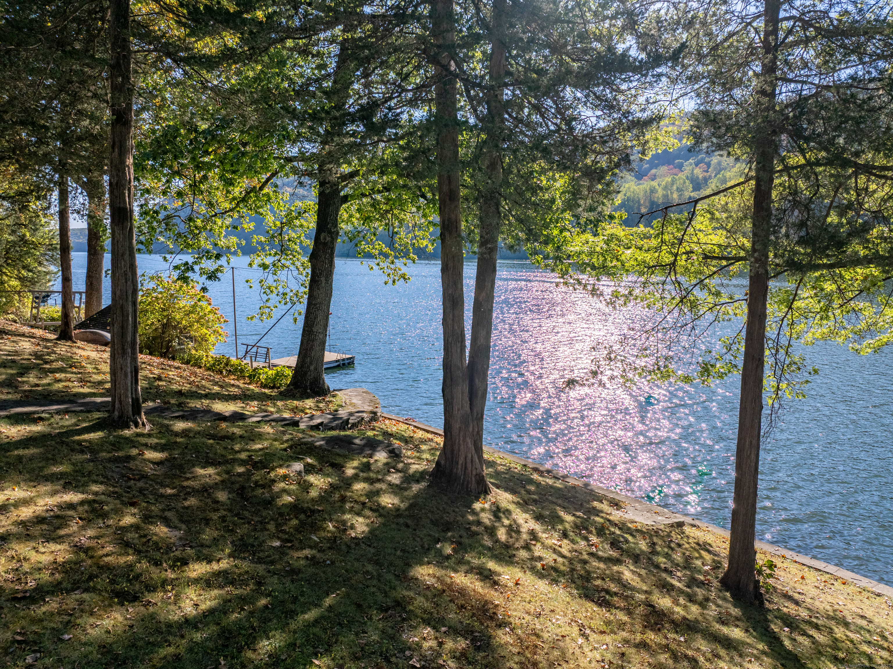 23 Echo Drive New Milford, CT 06776 - Photo 28 of 38 a view of a yard with plants and trees