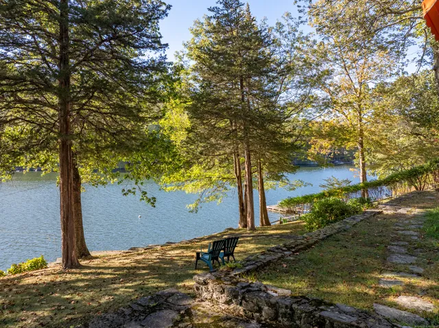 a view of a house with swimming pool