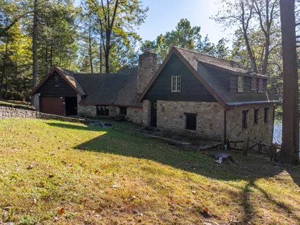 a view of a house with swimming pool
