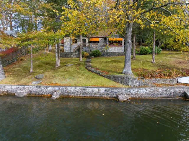 a view of an ocean and a mountain