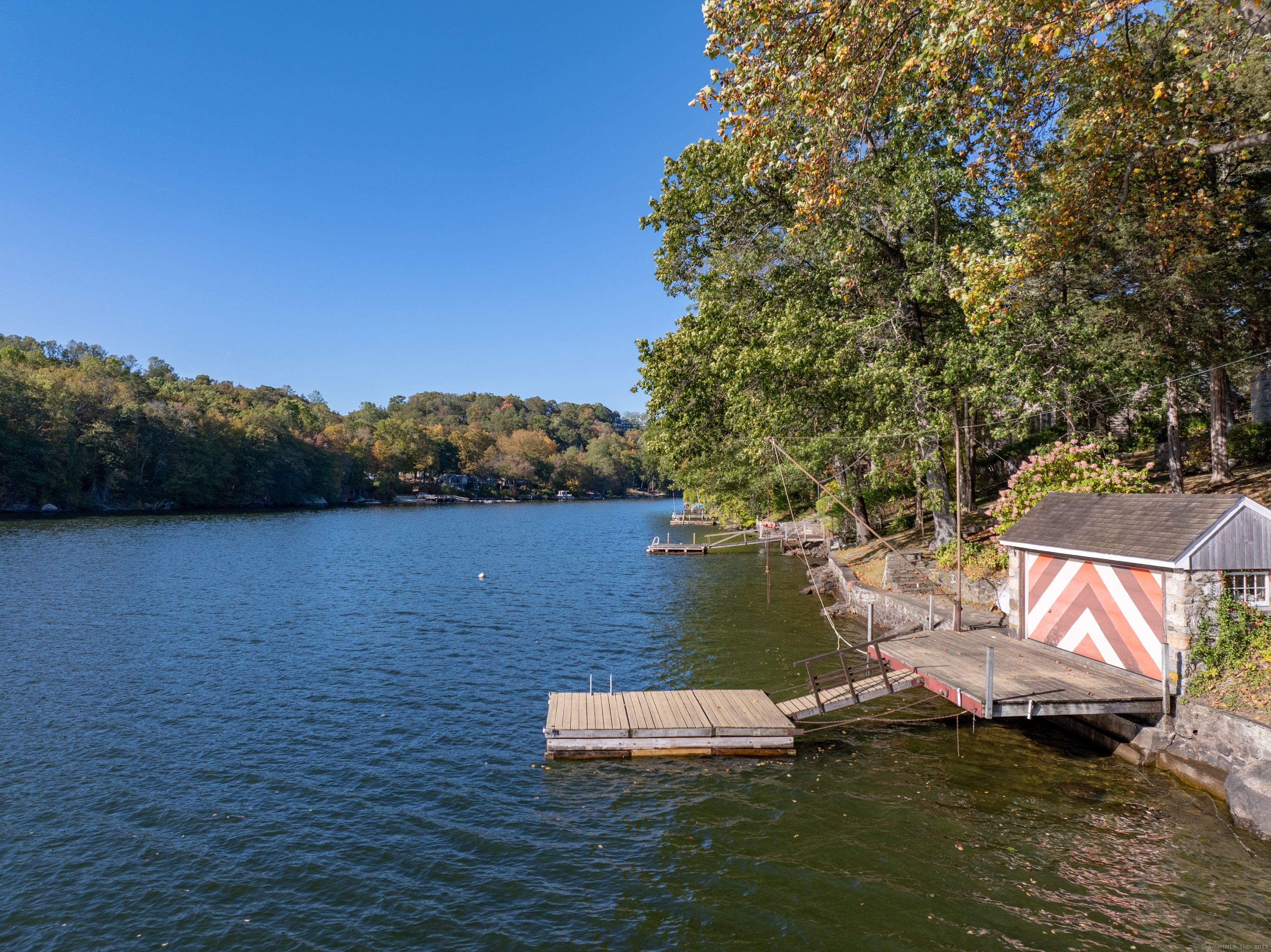 23 Echo Drive New Milford, CT 06776 - Photo 5 of 38 a view of a lake with houses