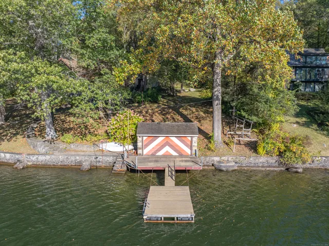 a view of a park with large trees