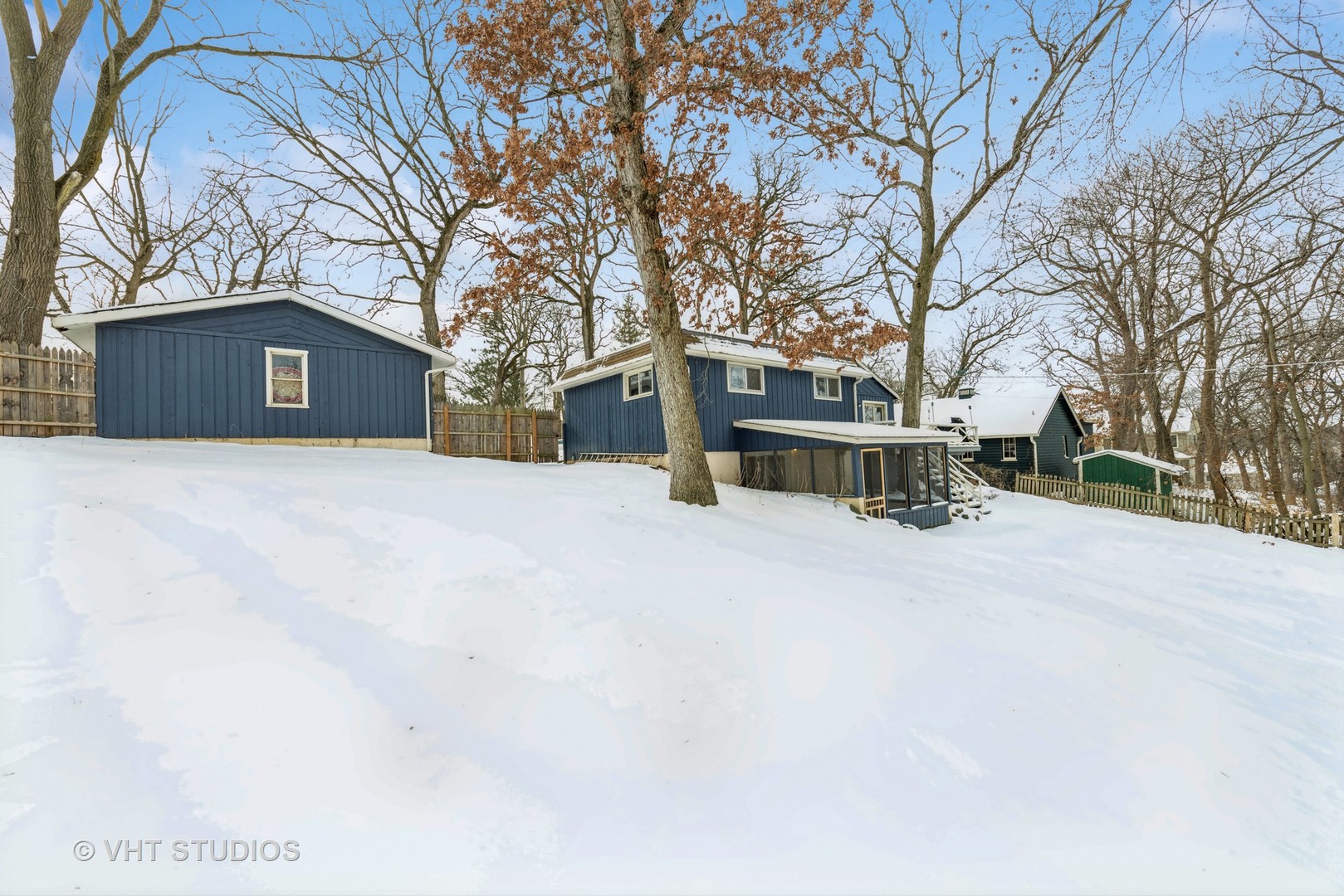 7712 Cedar Road Wonder Lake, IL 60097 - Photo 16 of 19 a view of a house with snow on the road