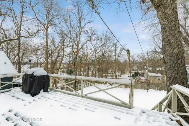 a view of a backyard of snow