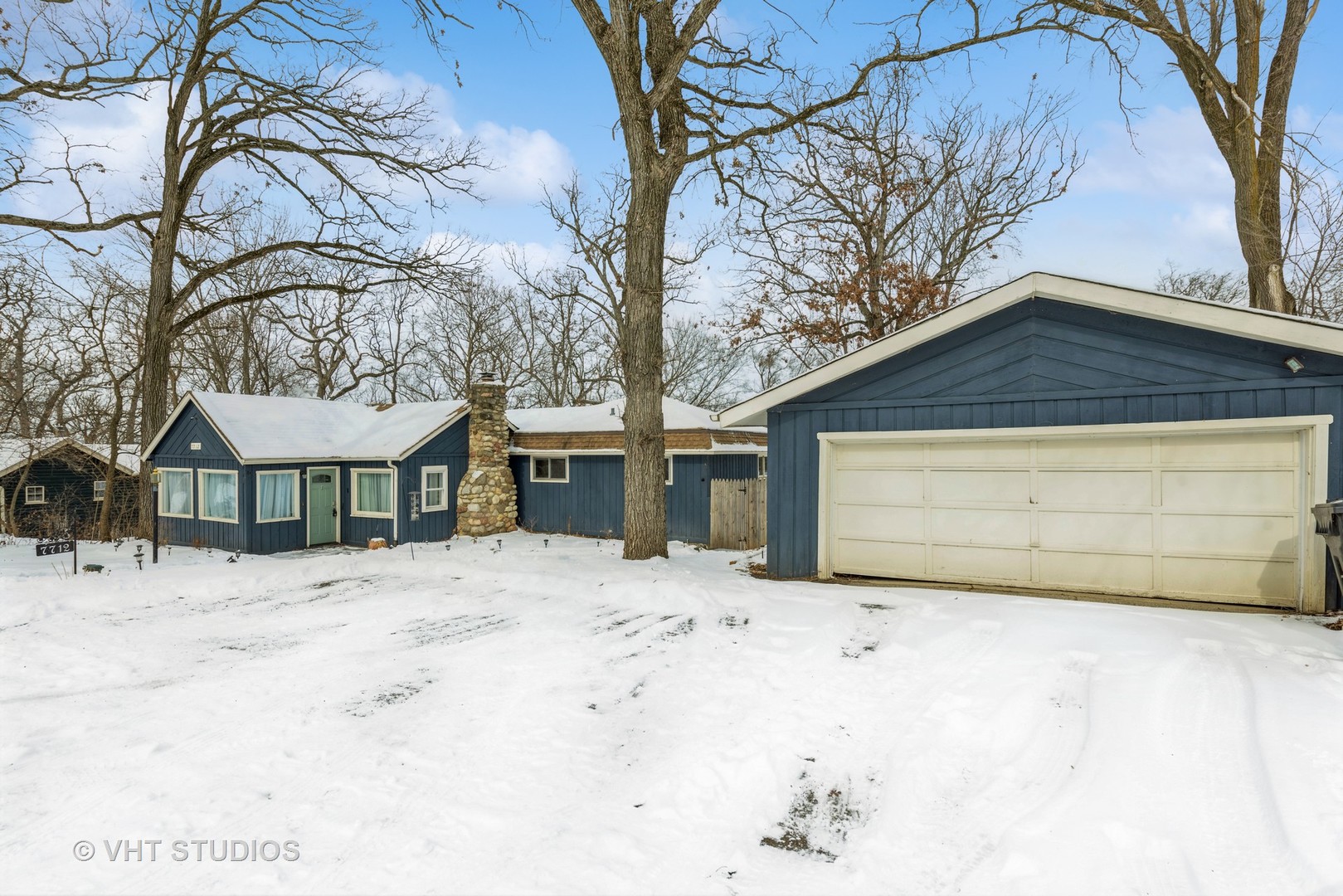 7712 Cedar Road Wonder Lake, IL 60097 - Photo 2 of 19 a front view of a house with a yard