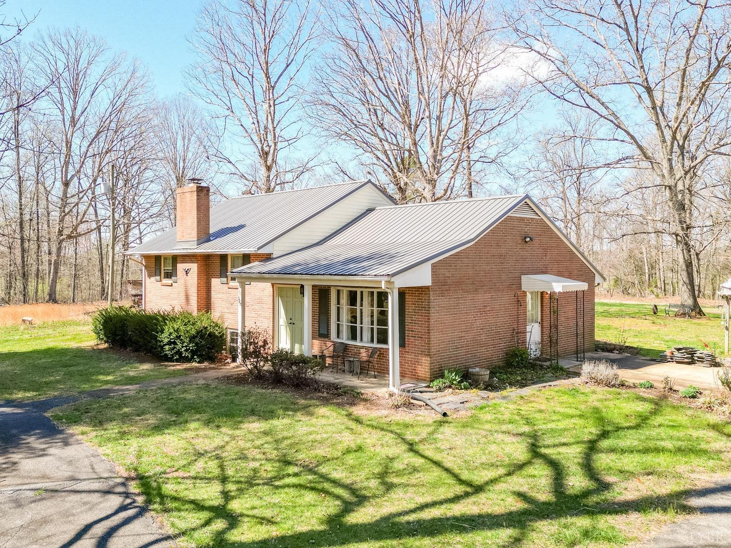 527 Gough Road Rustburg, VA 24588 - Photo 3 of 59 a front view of a house with a yard