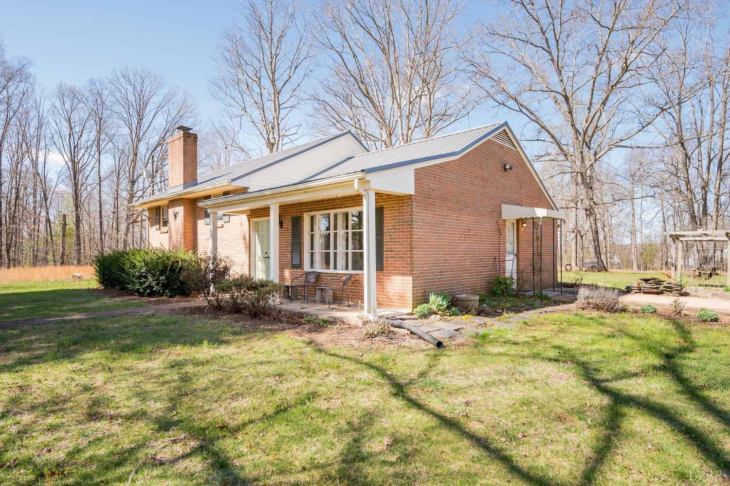 527 Gough Road Rustburg, VA 24588 - Photo 35 of 59 a view of house with yard and sitting area