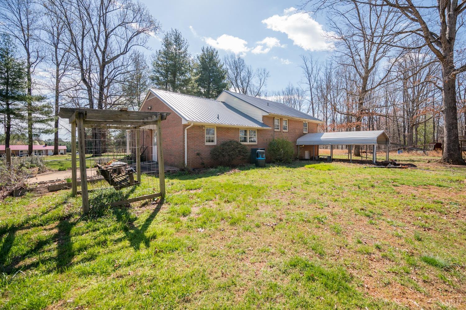 527 Gough Road Rustburg, VA 24588 - Photo 45 of 59 a view of a house with a yard and sitting area