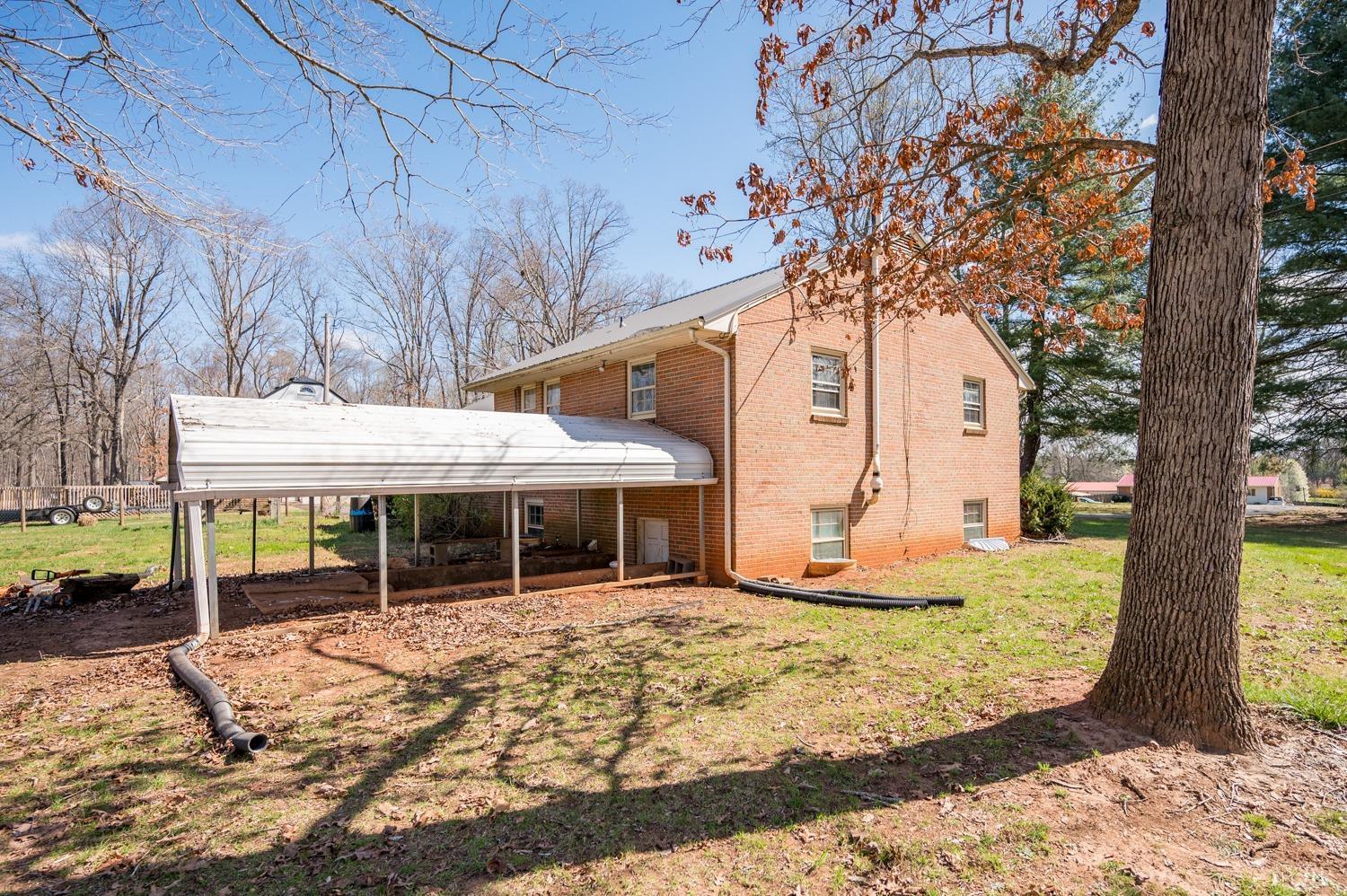 527 Gough Road Rustburg, VA 24588 - Photo 54 of 59 a view of a house with backyard porch and sitting area
