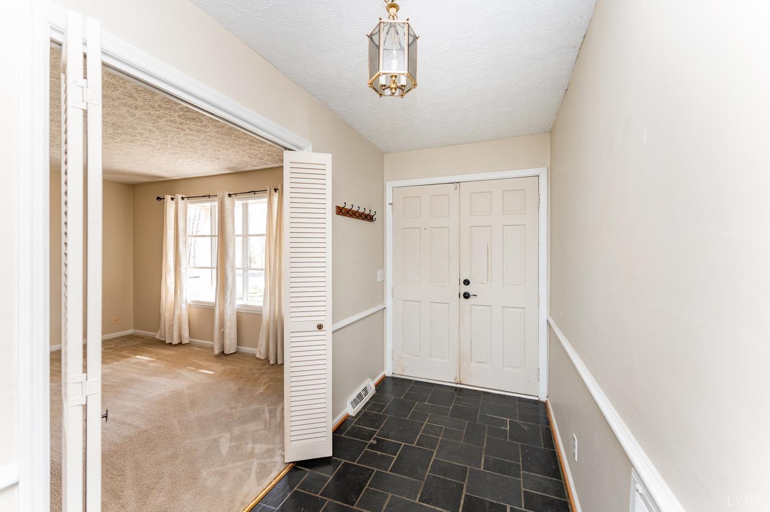 527 Gough Road Rustburg, VA 24588 - Photo 9 of 59 a view of a hallway