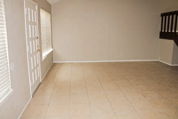 an empty room with windows