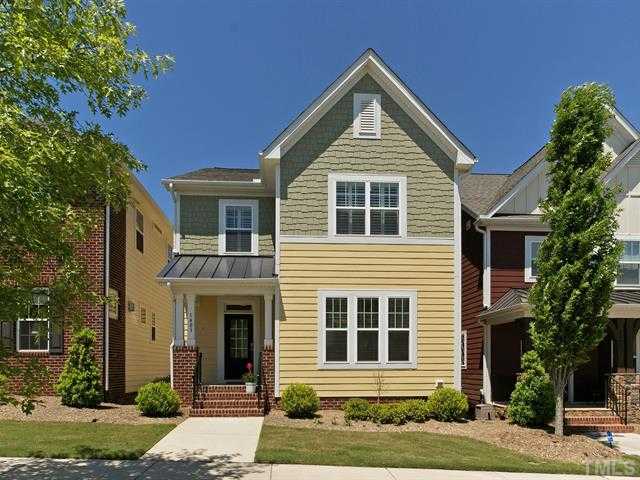 1403 Van Page Boulevard Raleigh, NC 27607 - Photo 1 of 25 a front view of a house with a yard