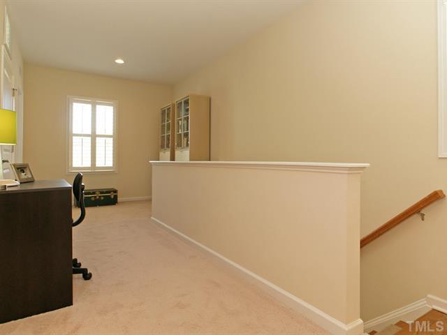1403 Van Page Boulevard Raleigh, NC 27607 - Photo 13 of 25 a view of a livingroom with furniture and windows