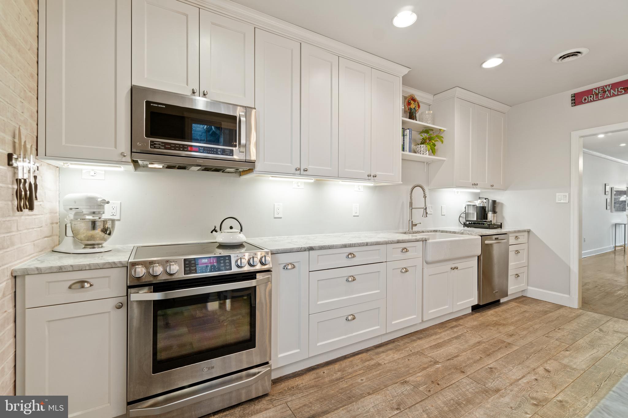 2531 Eastern Avenue Baltimore, MD 21224 - Photo 13 of 49 Kitchen with stainless appliances, quartz counters