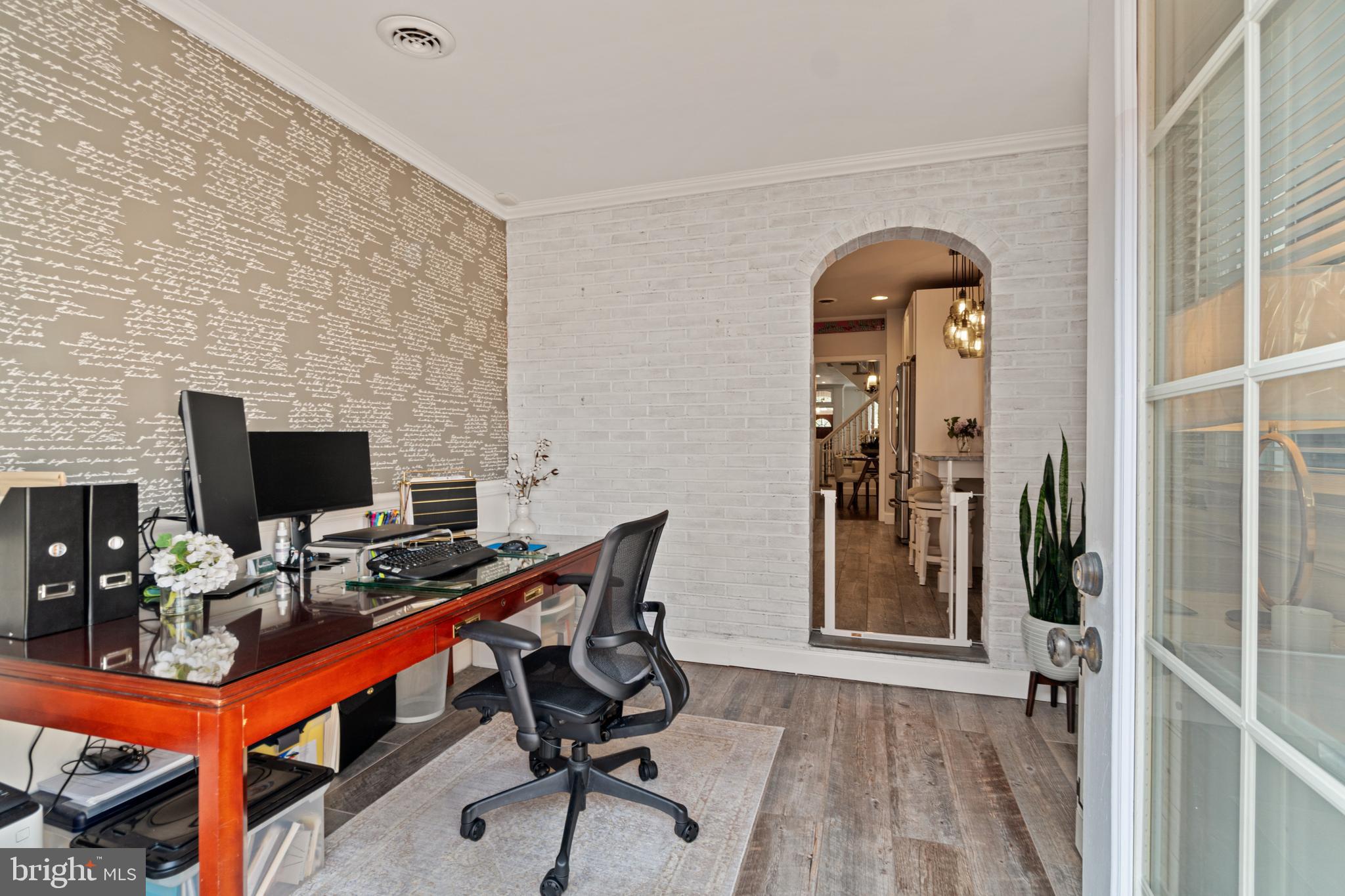 2531 Eastern Avenue Baltimore, MD 21224 - Photo 16 of 49 Home Office with whitewashed brick wall