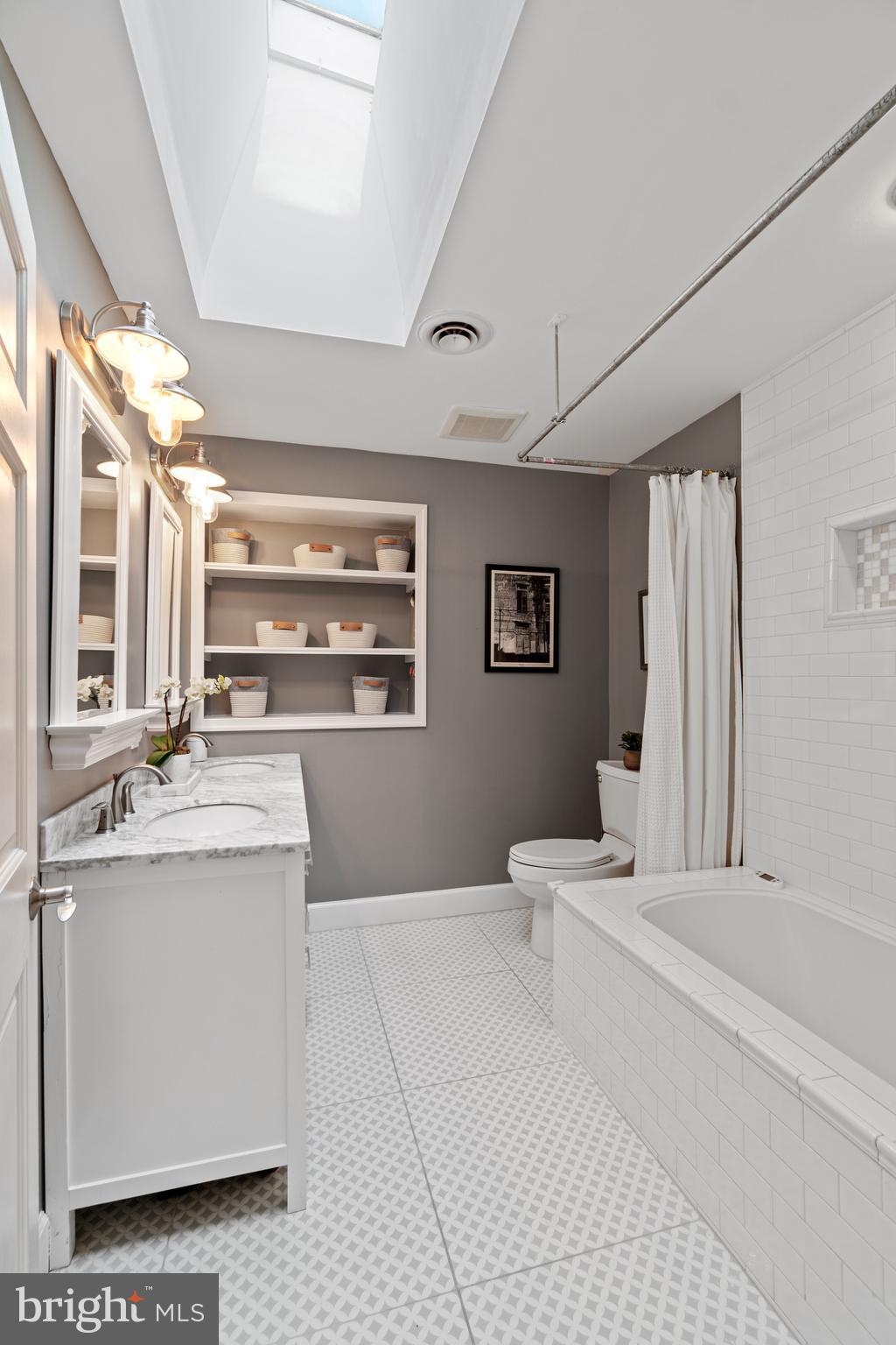 2531 Eastern Avenue Baltimore, MD 21224 - Photo 29 of 49 Primary Bath; dual sinks, marble counter, skylight
