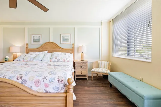 a bedroom with bed and window